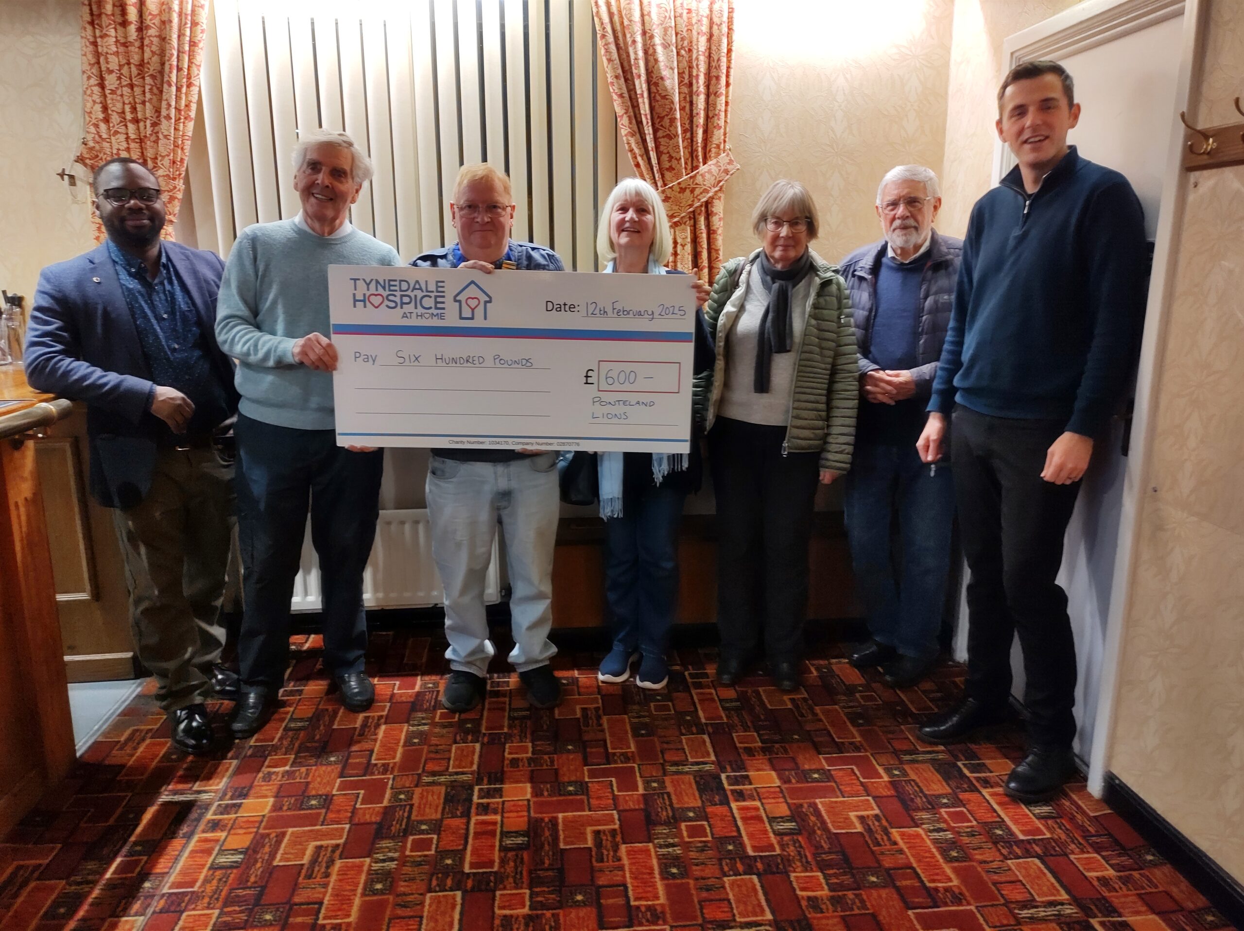 Cheque to Tynedale Hospice Nov 24 2